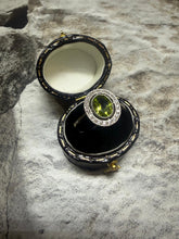 Platinum Peridot and diamond cluster ring