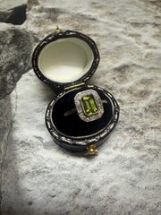 Platinum peridot and diamond cluster ring in "Art Deco" style
