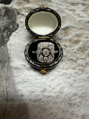 Platinum diamond cluster ring in "Art Deco" style