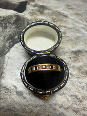 18ct yellow gold 9-stone ruby and diamond half eternity ring