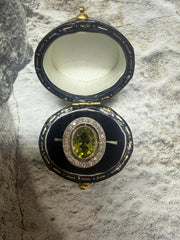Platinum Peridot and diamond cluster ring