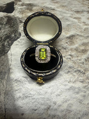 Platinum peridot and diamond cluster ring in "Art Deco" style
