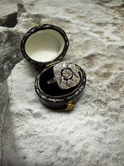 Platinum diamond cluster ring in "Art Deco" style