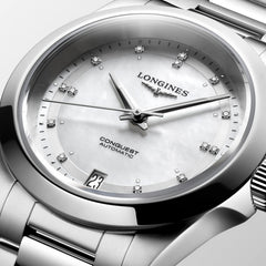 Longines Conquest - Mother of pearl dial